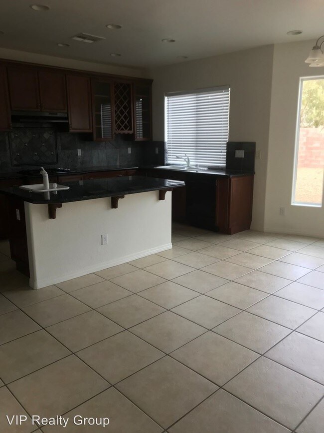 Building Photo - 4 br, 3.5 bath House - 7408 Midnight Rambler