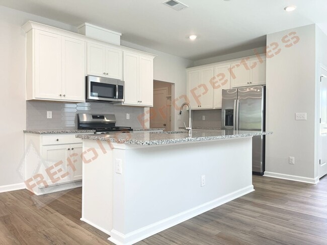 Building Photo - New Construction 4 Bedroom, 3.5 Bathroom Home with a First-Floor Primary Suite and Screened Porch...