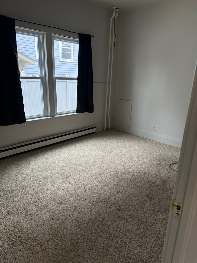 large bedroom on main level with large closet - 406 S 4th St