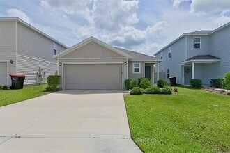 Building Photo - 8665 SW 44th Ct