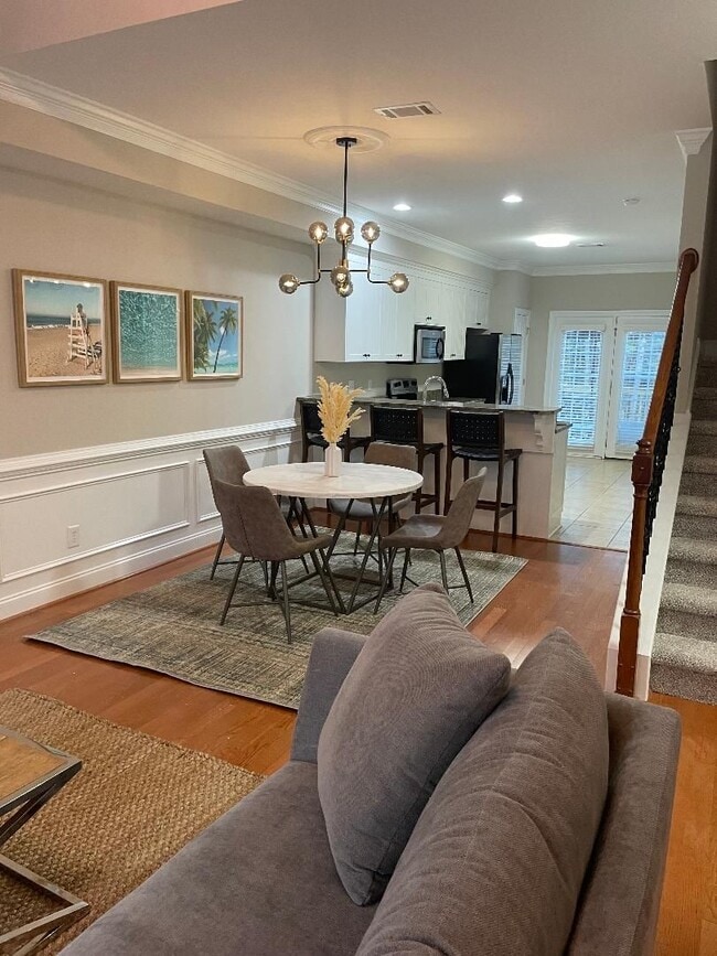 Building Photo - EXECUTIVE FULLY FURNISHED TOWNHOME IN GATED COMMUNITY