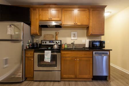 Kitchen, view with back to the couch - 443 NE GRAHAM ST