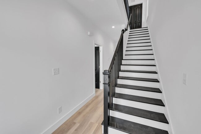 Building Photo - Modern New Construction Townhome with Roof...