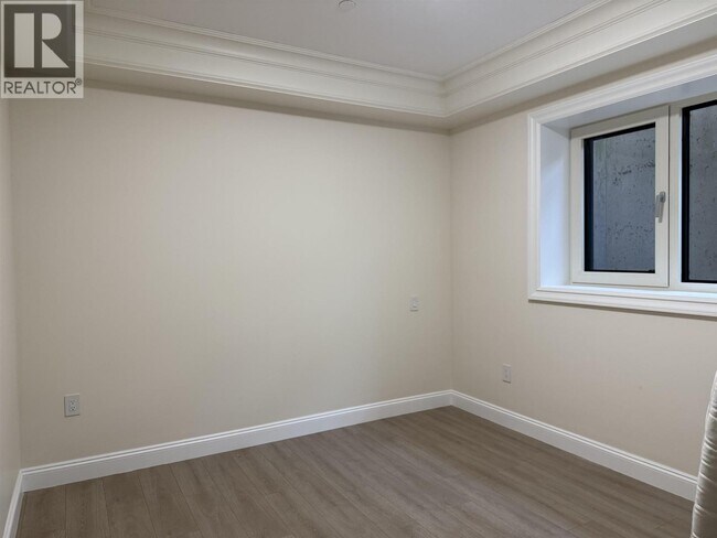 Photo du bâtiment - 1115 W 48th Ave