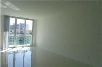 Building Photo - 19380 Collins Ave