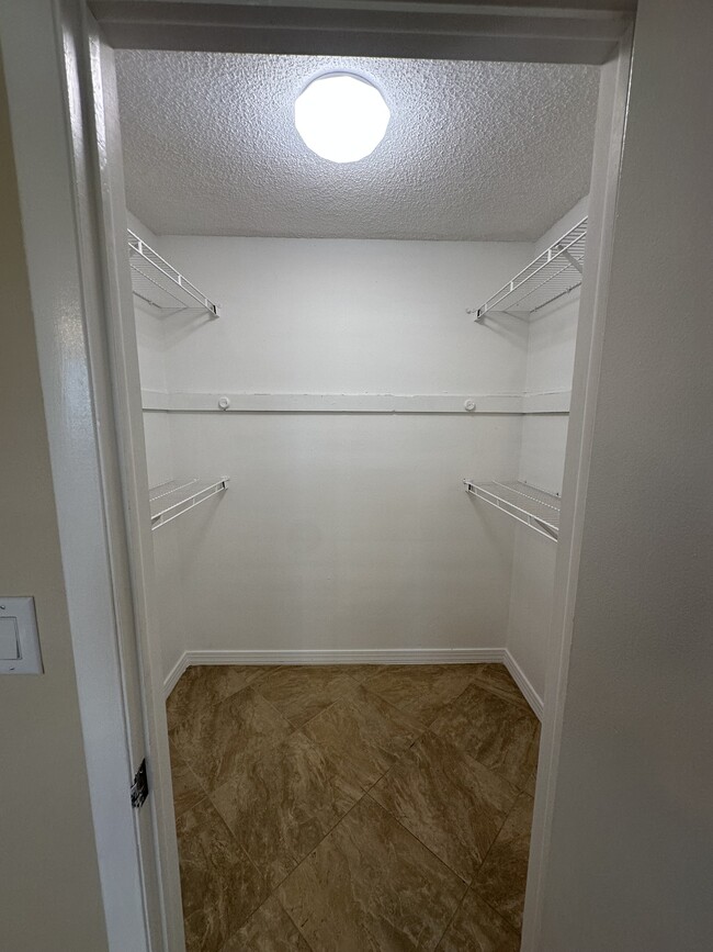 Building Photo - Poinciana Apartments