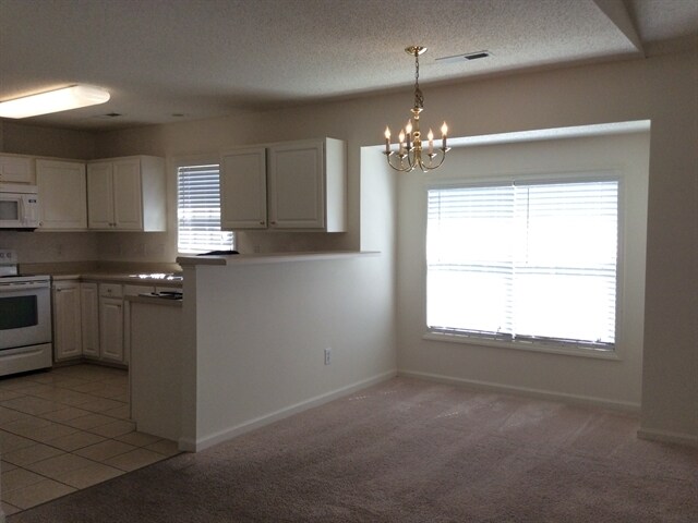 Building Photo - 5850 Regent Village Drive