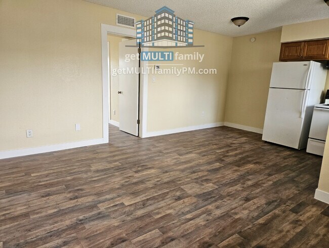 Building Photo - Tranquil Security: Gated 1 Bedroom, 1 Bath...