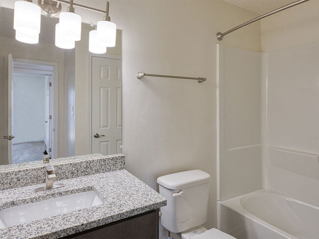 New lighting and vanities in renovated apartments - Latitudes Apartments