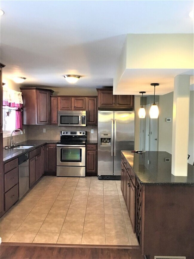 Foto del edificio - 4 br, 2 bath House - 214 E ROOSEVELT AVE