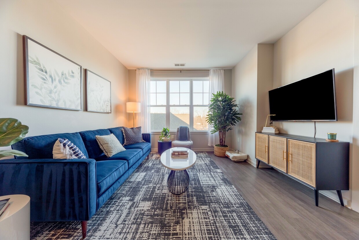 Living Room with Large Windows at The Heights at Glen Mills in Glen Mills, PA 19342 - Heights at Glen Mills