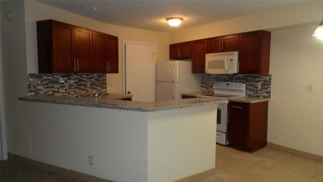 Foto del edificio - 9999 Summerbreeze Dr