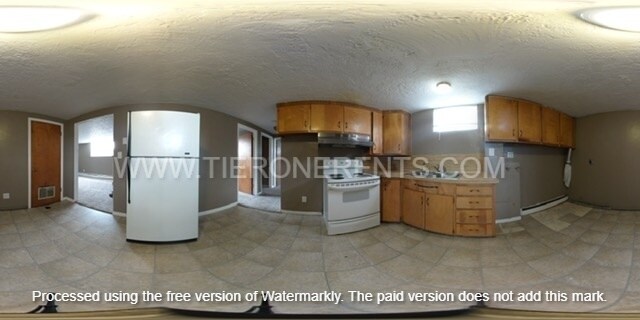Building Photo - Charming and spacious basement unit priced...