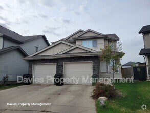 Building Photo - 6035-6034 4 Ave SW