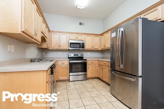 Building Photo - 7076 Maple Grove Rd