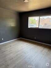 Building Photo - 1030 W Latham Ave