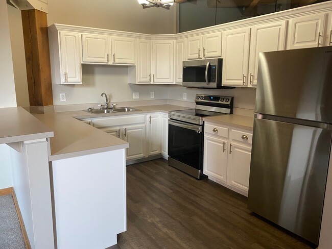 Two bedroom/13 Series Kitchen - Bridgeview Apartments