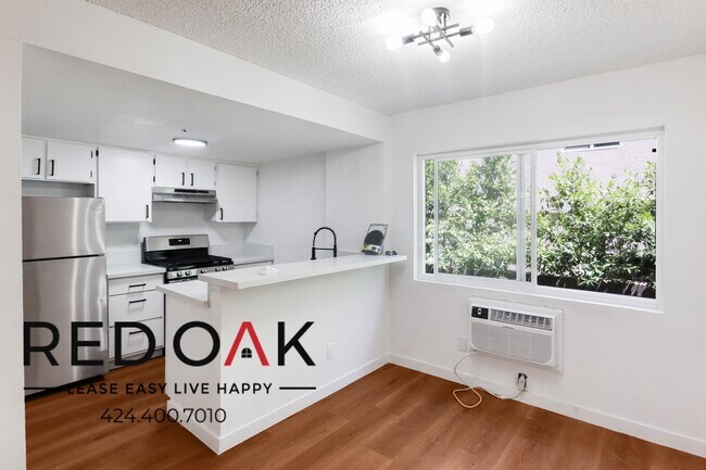 Building Photo - Two Bedroom with Stainless Steel Appliance...