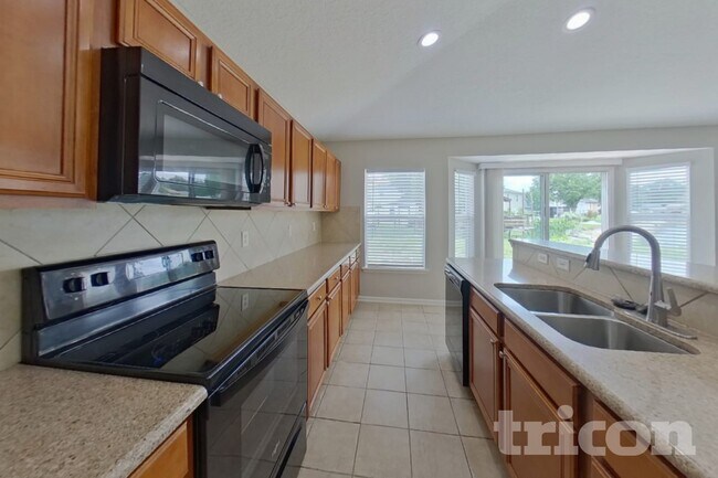 Foto del edificio - 11238 Justin Oaks Dr N