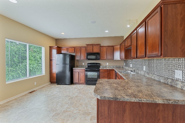 Building Photo - 14252 Newport Ave