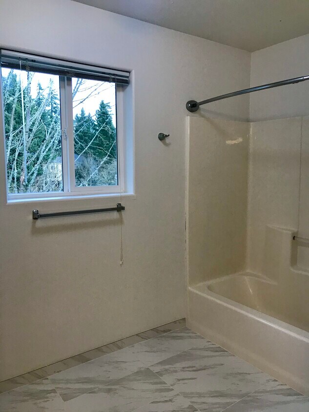 Master bathroom with view to green space - 1552 SE Ripplewood Ave