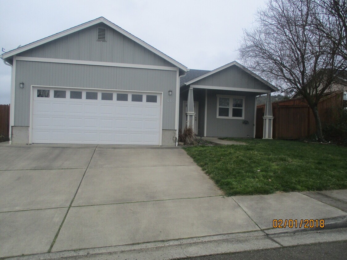 Primary Photo - Green area 3 Bedroom 2 Bath home with Garage