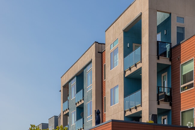 Warm light shines on apartments in Foster City.