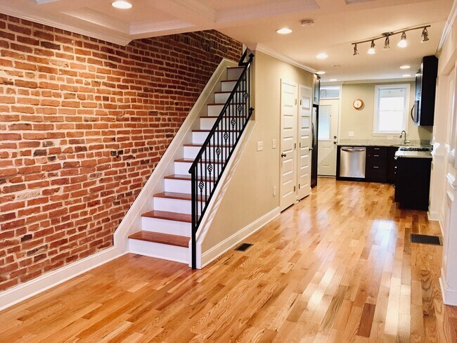 Building Photo - Charming 2 Bedroom/3 Bathroom Townhome w/ Den and In-Unit Laundry in Locust Point, MD! - Parking ...