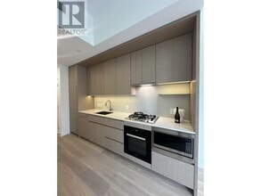 Building Photo - 5212-5212 Cambie St.
