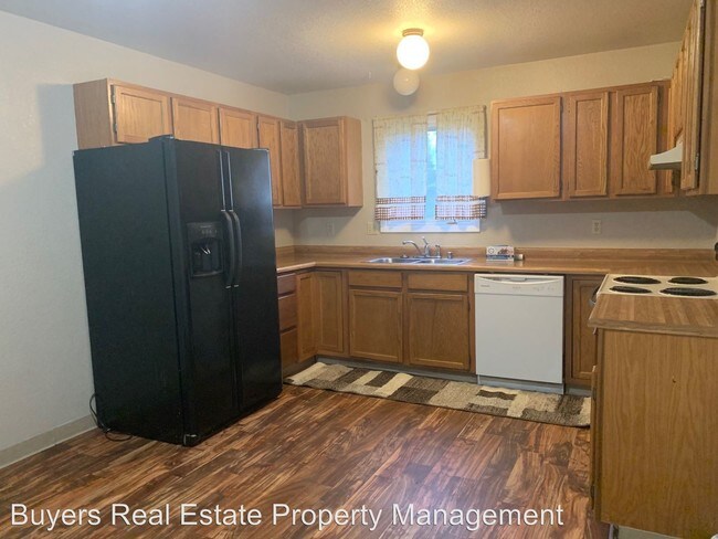Building Photo - 3 br, 1.5 bath House - 3831 E 66th Avenue