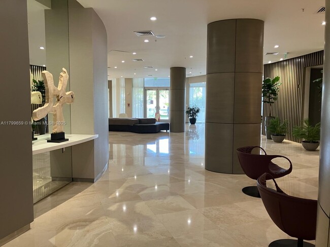 Building Photo - 10275 Collins Ave