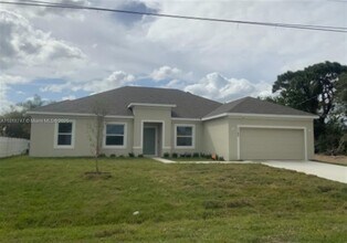 Building Photo - 1142 SW Edinburgh Dr