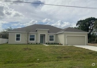 Building Photo - 1142 SW Edinburgh Dr