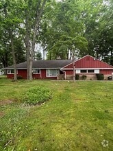Building Photo - 6195 N Woodlane Dr
