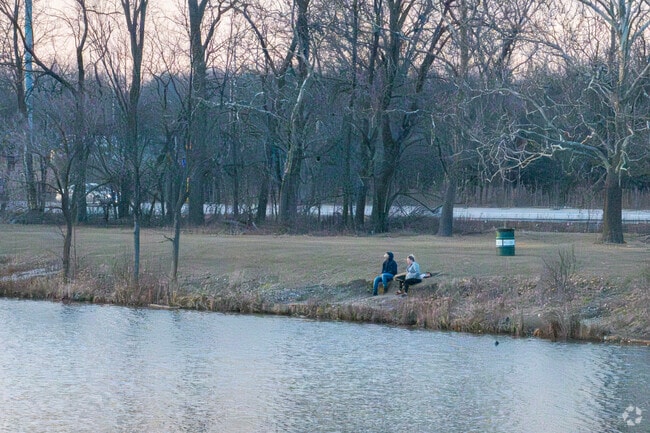 Just east of Rosemont, residents fish in the Iroquois woods as the sun sets.