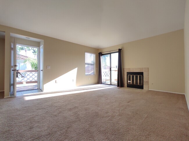 living room, to private balcony - 9428 Twin Trails Dr