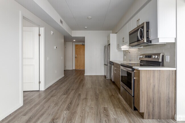 Stirling 1BR + Den, 1BA - 520SF - Kitchen/Living Room - The Scott