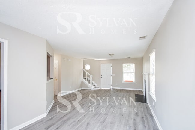 Building Photo - Lease today! No extra charge for contentme...