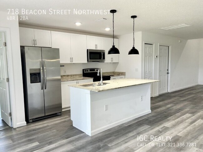 Building Photo - "Modern 4-Bedroom Home with Granite Counte...