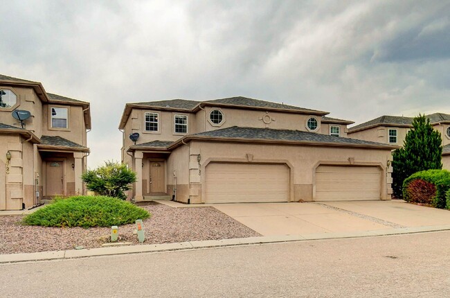 Building Photo - Updated Townhome Near Fort Carson with Unm...