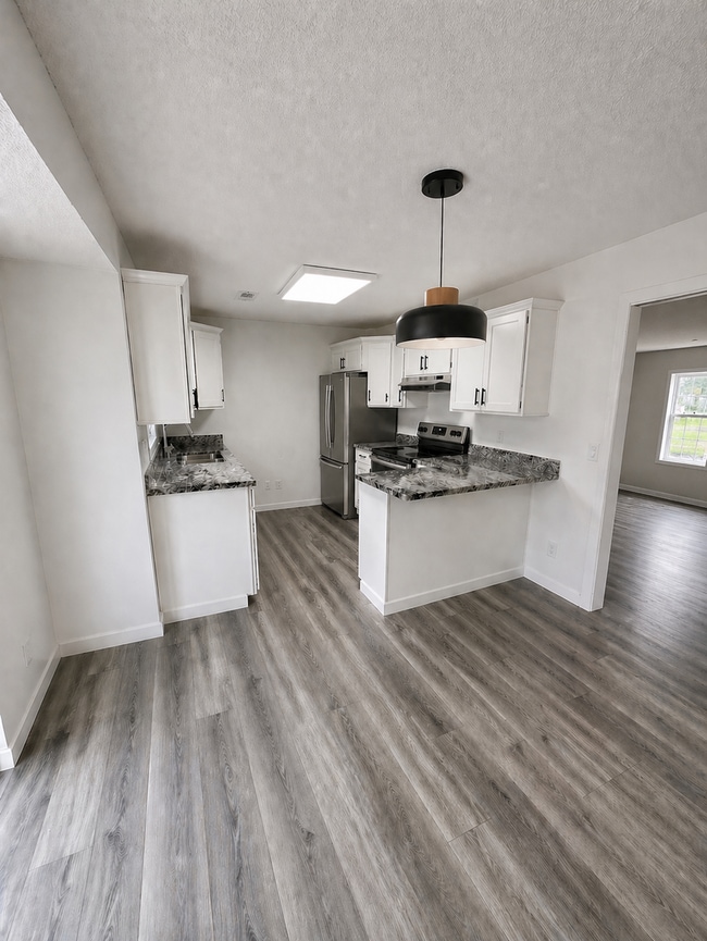 Photo - three bedroom house, in quiet family neighborhood