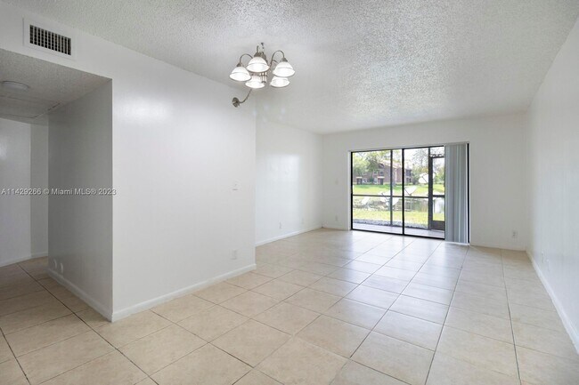 Building Photo - 9022 NW 28th Dr