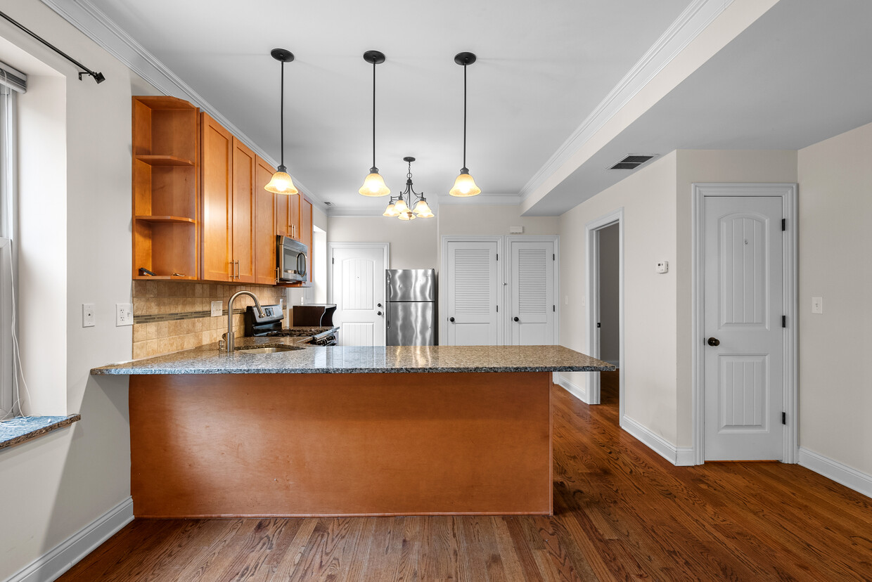 Kitchen with counter seating - 2117 W Irving Park Rd