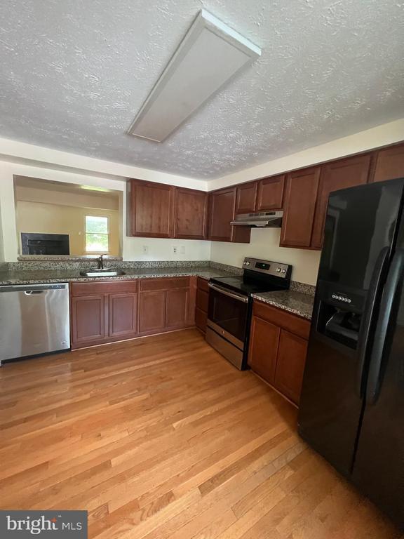 Building Photo - 7552 Rain Flower Way