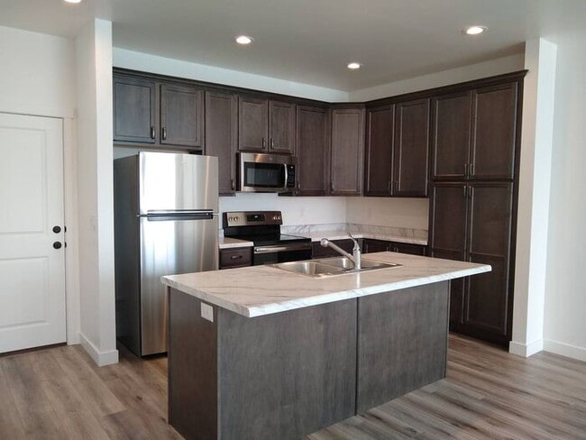 Building Photo - Beautiful Row End Townhouse w 2 car attached