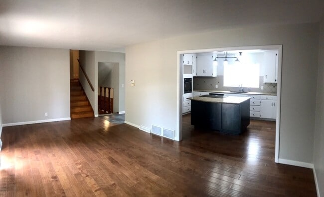 Building Photo - 4 bed / 1 bath 2 car garage home available...