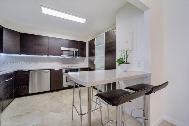 Building Photo - 9801 Collins Ave