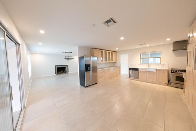 Building Photo - NEWLY RENOVATED SLEEK AND MODERN 4 BEDROOM...