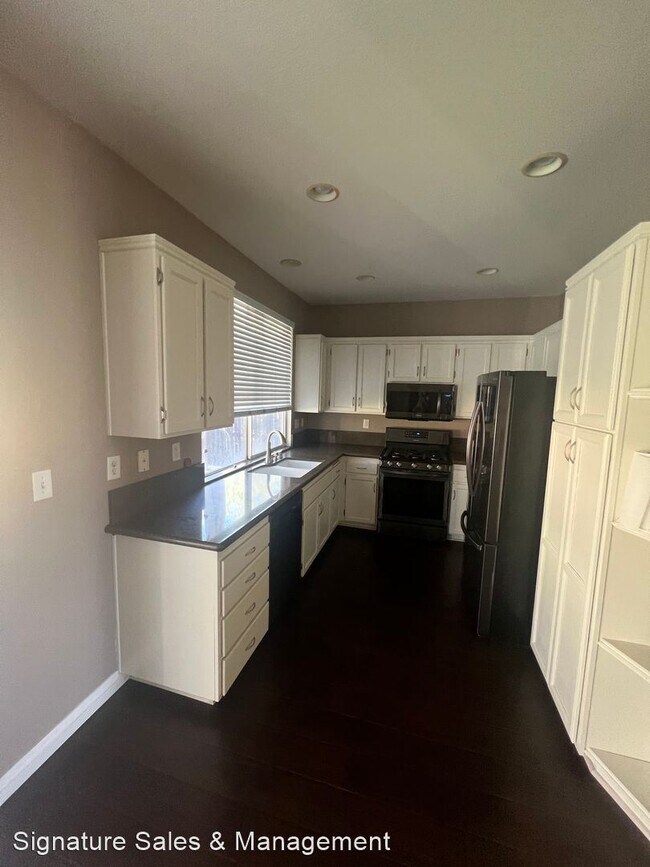 Foto del edificio - 4 br, 2.5 bath House - 27519 Fallbrook Ct