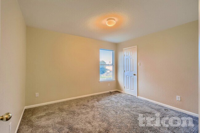 Foto del edificio - 9711 Sugarblossom Ln